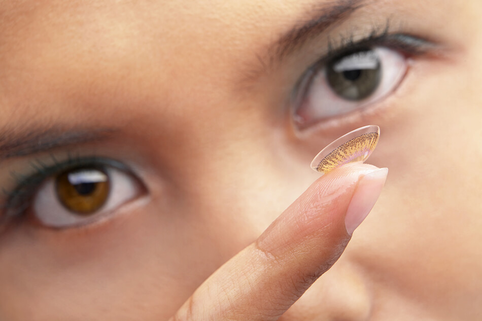 Contact lenses and eye glasses on eye-chart