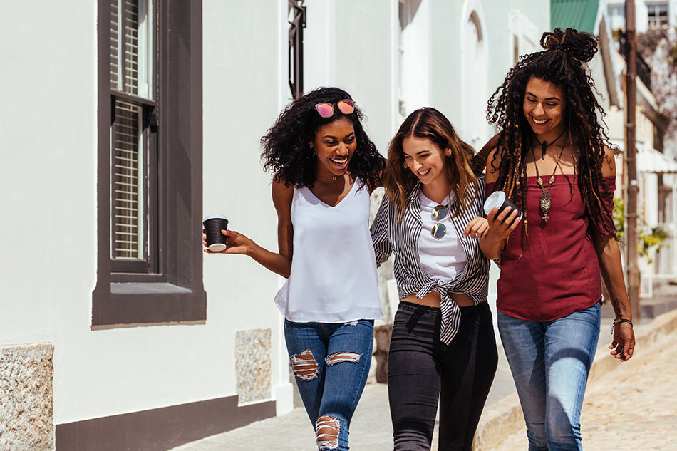 Trio of fashionable ladies on the street